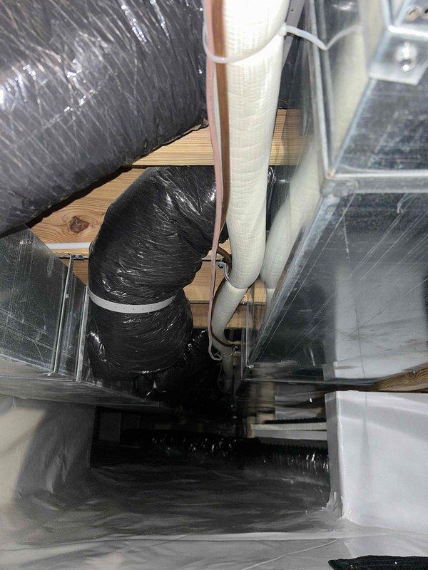 Investigated line set vibration issue on Bosch HVAC system as requested. Inspected the insulated black flexible duct and PVC drainage pipe installation between joists, along with all connection points at the main unit. Identified vibration source and implemented appropriate solution to eliminate the noise concern.