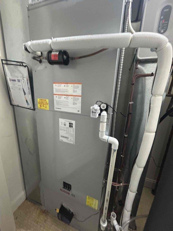 Investigated line set vibration issue on Bosch HVAC system as requested. Inspected the insulated black flexible duct and PVC drainage pipe installation between joists, along with all connection points at the main unit. Identified vibration source and implemented appropriate solution to eliminate the noise concern.