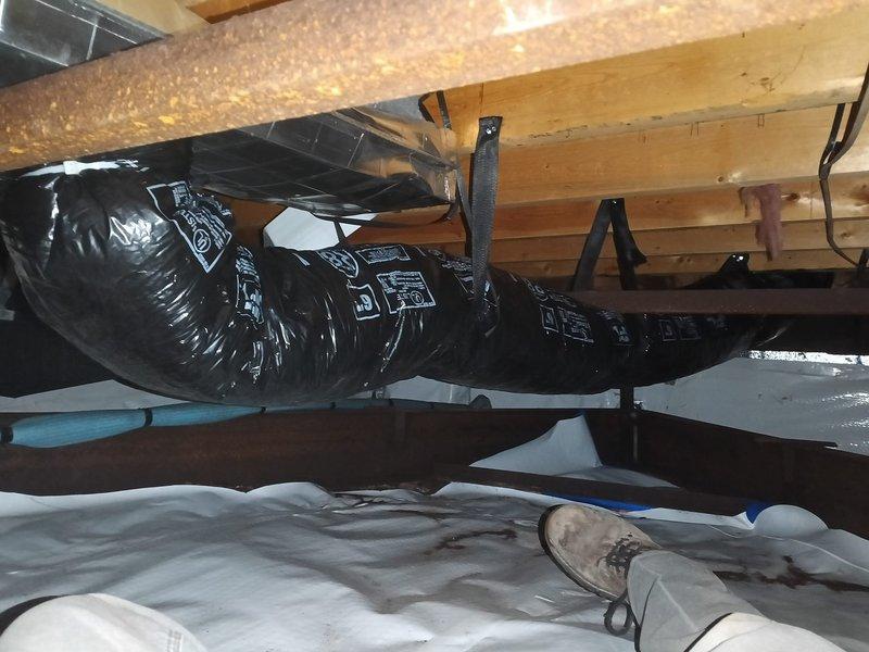 Completed installation of 6-inch flexible ductwork per approved quote, relocating an office duct closer to wall and adding new duct run to bedroom. Accessed crawlspace to properly secure insulated black flex ducts to wooden joists, and installed vapor barrier to ensure system efficiency and proper airflow distribution.