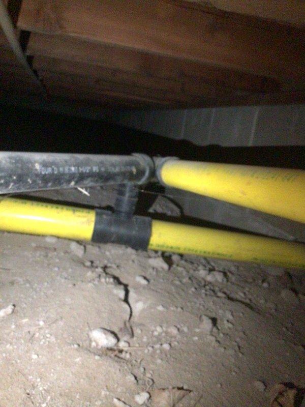 Completed scheduled plumbing inspection under prepaid maintenance agreement. Inspected crawl space gas/utility lines and connections for proper installation and integrity. Examined bathroom shower/tub area for proper drainage functionality, noting condition of floor drains and surrounding tile work.