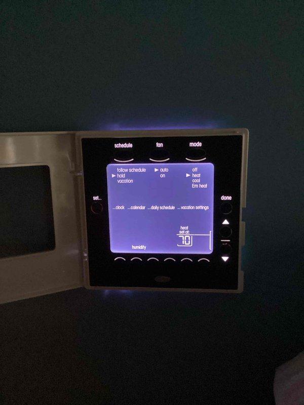 Performed routine HVAC maintenance service on heat system with CCHP-Cooling contract (renewal 4/11/26). Inspected thermostat settings, confirming proper operation with emergency heat mode functioning correctly at 70°F setpoint. Examined and cleaned blower wheel assembly, noting normal wear with no significant issues requiring immediate attention.