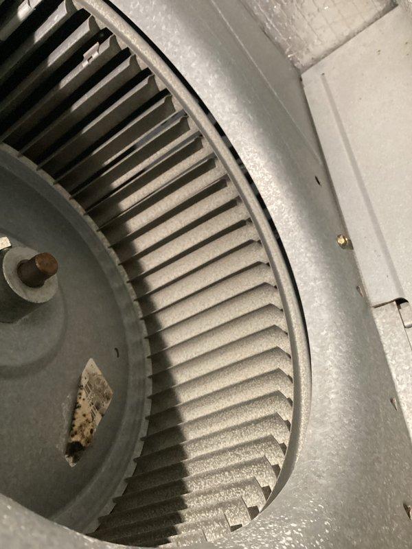 Performed routine HVAC maintenance service on heat system with CCHP-Cooling contract (renewal 4/11/26). Inspected thermostat settings, confirming proper operation with emergency heat mode functioning correctly at 70°F setpoint. Examined and cleaned blower wheel assembly, noting normal wear with no significant issues requiring immediate attention.