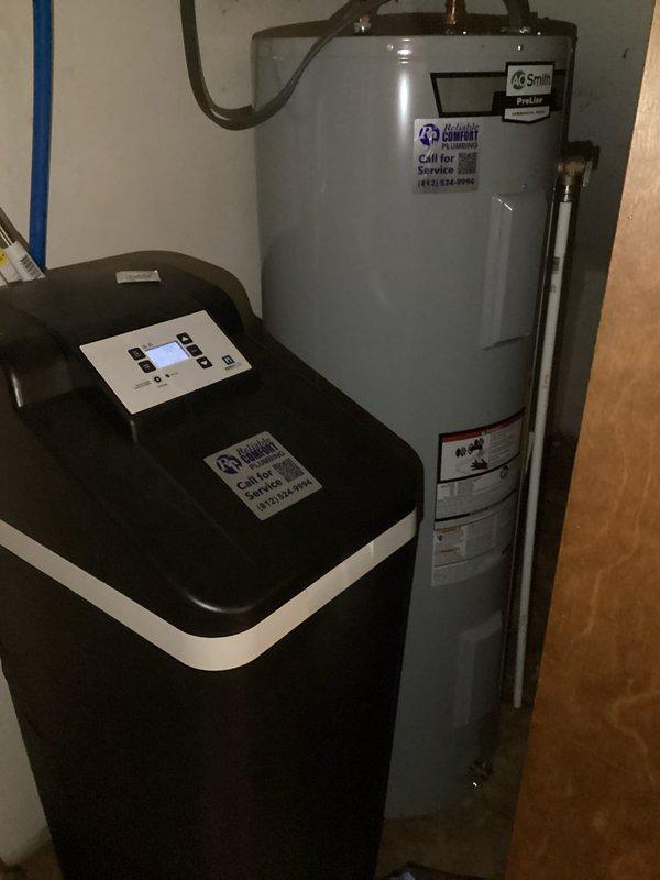 Performed routine heating tune-up on Lennox outdoor unit as scheduled. Inspected system components, cleaned accessible areas, and verified proper operation. Also noted Smith ProLine water heater and water treatment system in utility area, both in satisfactory condition with no immediate service needs.