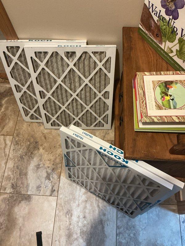 Performed Basic Monthly CCH maintenance service on heating system. Removed and cleaned washable filters. Verified thermostat operation - unit functioning properly in Heat mode at 69°F with "Heat On" status displayed on Honeywell digital thermostat.