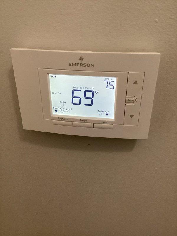 Performed routine Comfort Care maintenance on Lennox heating system, including replacement of 20x20x4 CCH filter. Inspected system operation and verified proper thermostat function with heat setting at 75°F (current temperature 69°F, "Heat On" indicator active). System operating normally in Auto mode with all components in good working condition.