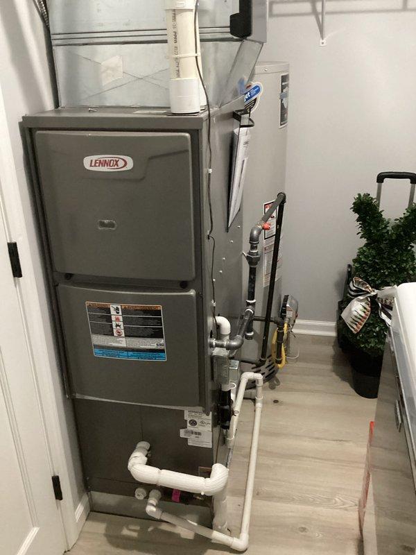 Performed routine Comfort Care maintenance on Lennox heating system, including replacement of 20x20x4 CCH filter. Inspected system operation and verified proper thermostat function with heat setting at 75°F (current temperature 69°F, "Heat On" indicator active). System operating normally in Auto mode with all components in good working condition.