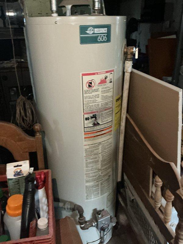 Performed scheduled maintenance on two heating systems. Inspected 605 water heater in utility area, confirming proper connections and operational status. Checked Honeywell ProSeries thermostat, verified heat mode functioning correctly with temperature holding steady at 75°F, and replaced standard 20x25x4 filter as part of monthly maintenance agreement.