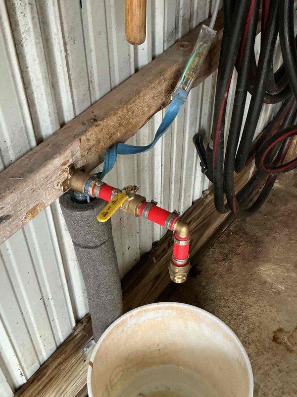 Responded to service call regarding leaking ball valve on outdoor water line previously serviced. Inspection revealed the brass valve assembly on the copper pipe system was leaking at connection point. Replaced faulty ball valve and verified proper operation with no leaks present.