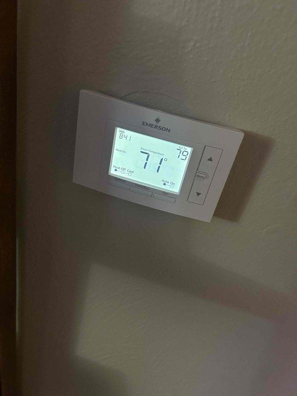 Responded to customer complaint of unusual boiler noise suspected to be air in the system. Performed diagnostic checks including thermostat inspection (confirmed set at 71°F with actual temperature reading 84°F) and pressure gauge evaluation. Purged air from system which resolved the noise issue and restored normal operation.