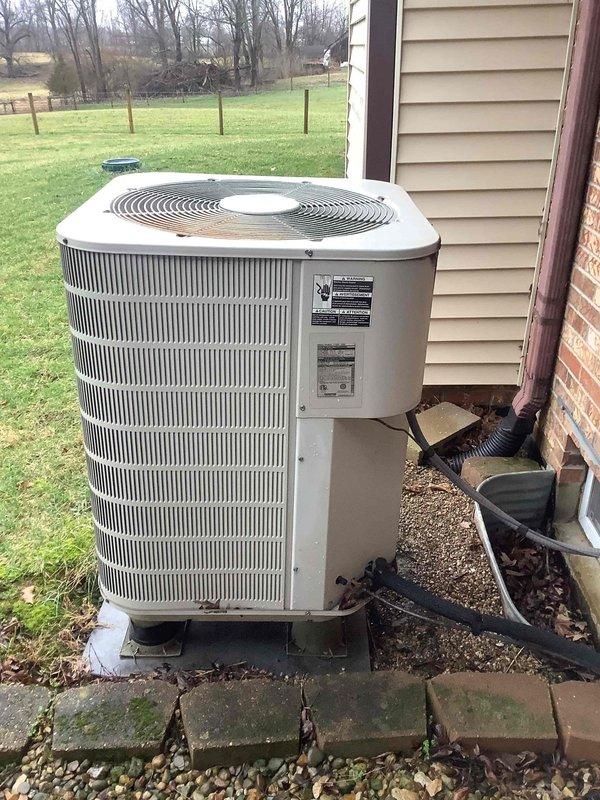 Diagnosed heat pump system operating exclusively on emergency heat. Performed system evaluation and pressure testing using manifold gauges on the outdoor condenser unit. Confirmed defrost cycle malfunction causing extended heating times and inefficient operation.