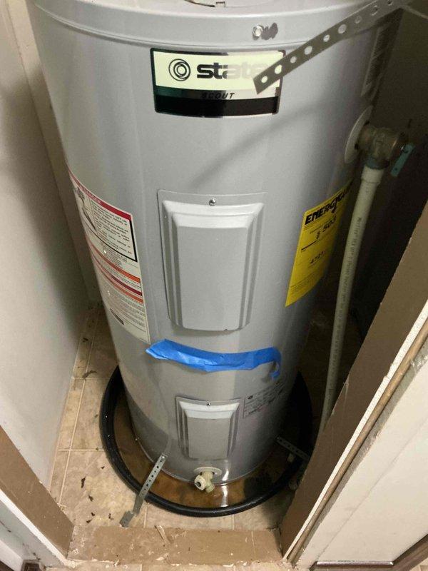 Responded to service call for a water heater with no hot water issue that had persisted for some time. Upon inspection of the cylindrical tank water heater installed in a utility closet, identified operational failure. Restored hot water functionality to the residential system, ensuring proper temperature regulation and performance.