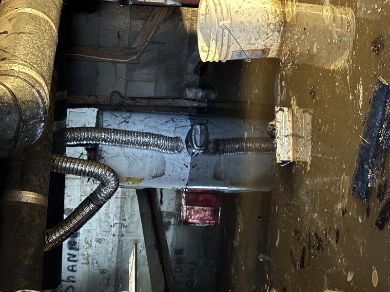 Upon inspection of the non-functioning sump pump, observed significant moisture damage in the utility area with visible water damage on walls and potential mold growth. Replaced failed sump pump with new unit, tested operation through multiple cycles, and cleared debris from discharge line to ensure proper drainage.