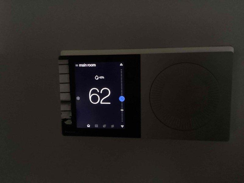 Performed scheduled cooling system maintenance on an HVAC system with thermostat operating at 62°F. Verified proper thermostat functionality with the cooling mode active as indicated by the snowflake icon. Observed humidity level at 43%, which is within acceptable parameters for residential cooling operation.