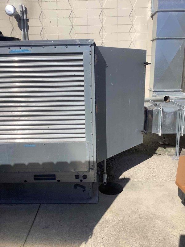 Responded to no-cooling call for commercial HVAC system serving retail location. Diagnosed electrical connection issue at the outdoor condensing unit, specifically a damaged connector with loose green wire. Repaired wiring connection and restored proper cooling operation to the system.