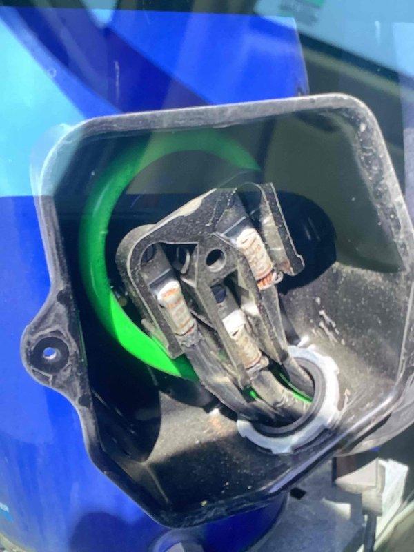 Responded to no-cooling call for commercial HVAC system serving retail location. Diagnosed electrical connection issue at the outdoor condensing unit, specifically a damaged connector with loose green wire. Repaired wiring connection and restored proper cooling operation to the system.