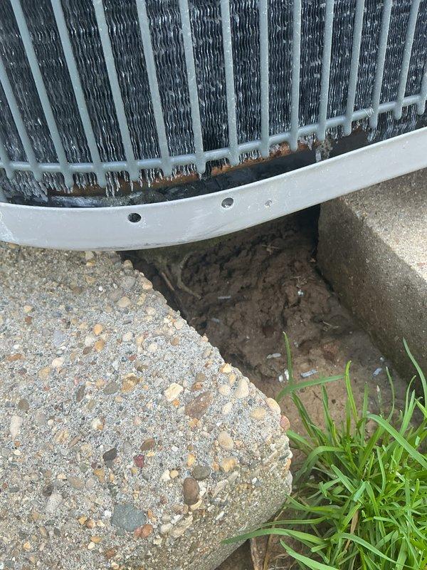 Performed heat maintenance service on Honeywell thermostat system (CCH, Renew-8/8/26). Observed thermostat functioning properly with heat setting at 69° and current temperature reading at 56°. Noted significant rust and corrosion on outdoor unit cooling fins, with deterioration along bottom edge requiring attention in future service. Filter size was undetermined during this visit.