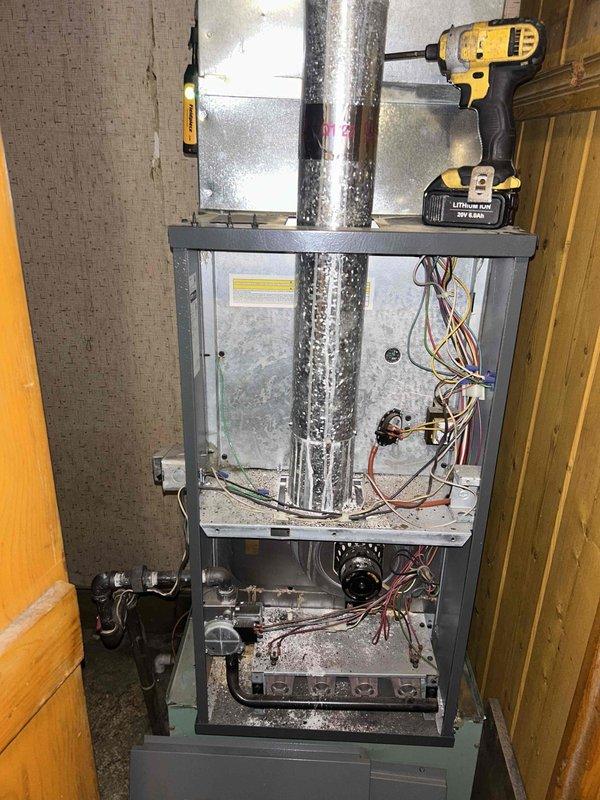 Responded to no cool service call for central air system. Upon inspection, found significant dust accumulation in return air filter and ductwork restricting proper airflow. Accessed furnace cabinet to inspect blower motor and electrical connections, cleaned filter housing, and restored system operation after verifying proper airflow at all vents.