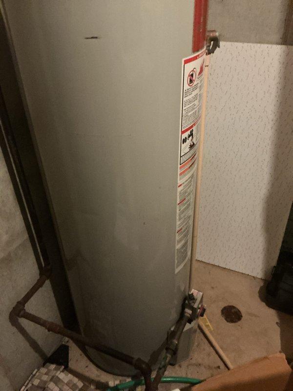 Completed scheduled heating tune-up service on system with water heater inspection and thermostat functionality check. Verified proper operation of thermostat (set to 74°F) with appropriate temperature regulation and confirmed water heater connections, safety systems, and mounting hardware were secure and in good working condition.