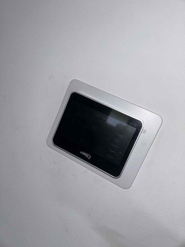 Diagnosed and replaced faulty Lennox thermostat control module that was causing system operation issues. Installed new thermostat interface, verified proper connections to main circuit board, and confirmed system functionality after installation.