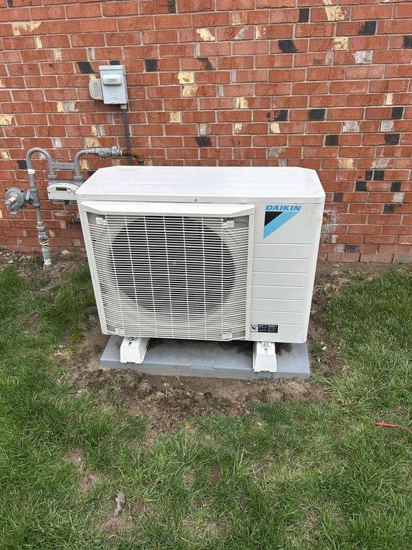 Diagnosed communication error with thermostat (error code 21) affecting system operation. Inspected outdoor Daikin condensing unit and verified proper electrical connections to ensure communication between components. System restored to normal operation.