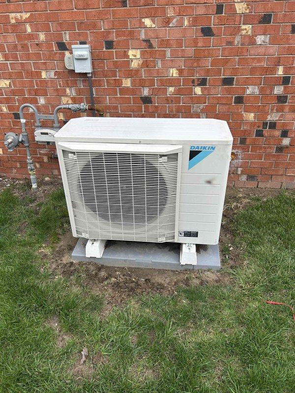 Diagnosed communication error with thermostat (error code 21) affecting system operation. Inspected outdoor Daikin condensing unit and verified proper electrical connections to ensure communication between components. System restored to normal operation.