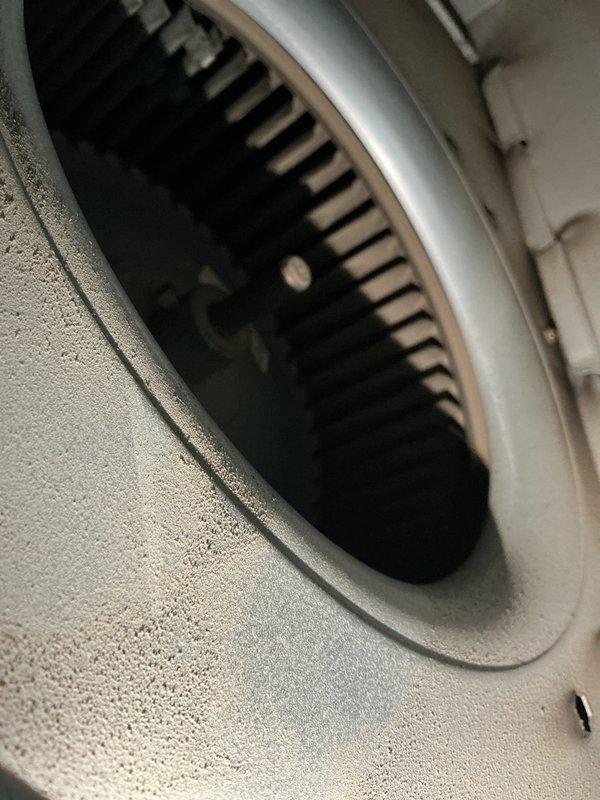 Performed Basic Monthly maintenance service on HVAC system (CCH). Inspected and photographed blower wheel assembly which showed minor dust accumulation but remains in functional condition. Also documented water heater installation with proper connections including flexible stainless steel water lines and PVC venting pipe.