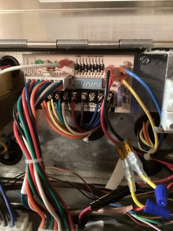 Service was placed on hold due to flooding at the property and requires rescheduling. Identified need for warranty replacement of ECM board (Enertech Global LLC #241409263-001) per technical support recommendation. Visual inspection of control panel and circuit board components was completed with photographic documentation for reference.