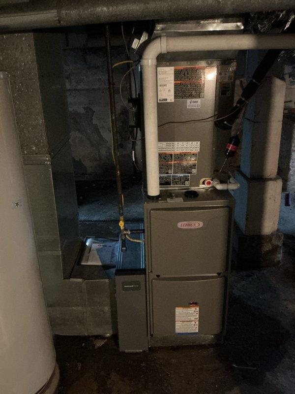 Performed scheduled heat maintenance on Lennox furnace system. Inspected and cleaned unit components, replaced 20x25x4 air filter under CCH program (expired but owed). Documentation photos taken of furnace installation and adjacent water heater for service records.