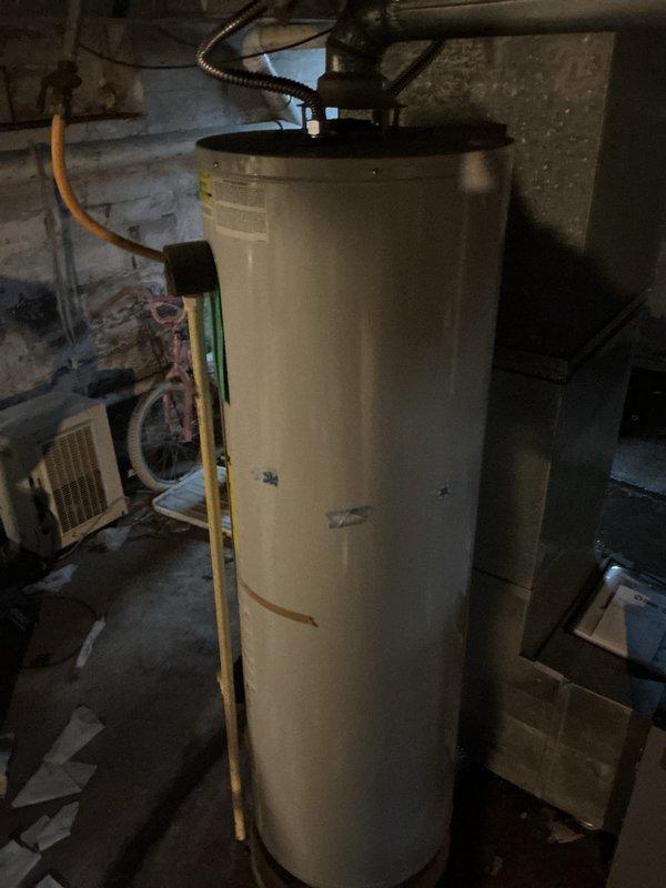 Performed scheduled heat maintenance on Lennox furnace system. Inspected and cleaned unit components, replaced 20x25x4 air filter under CCH program (expired but owed). Documentation photos taken of furnace installation and adjacent water heater for service records.