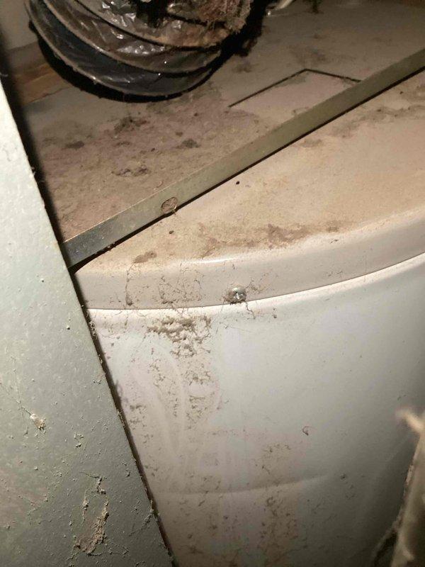 Performed monthly maintenance service on commercial cooling/heating unit. Observed significant dust accumulation on exterior components and housing. Noted frost buildup on refrigerant lines and cooling coils, indicating potential refrigerant flow issues that require further investigation.