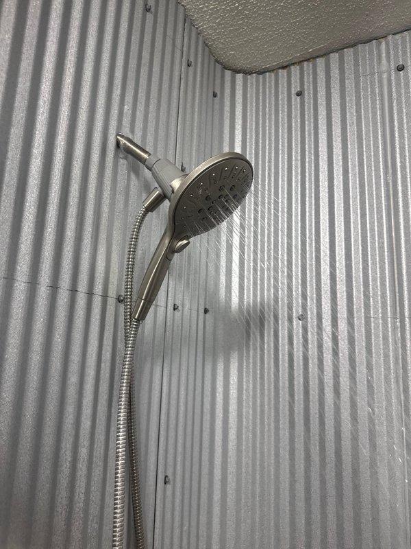 Performed scheduled plumbing maintenance inspection per prepaid service agreement. Inspected shower installation, verifying proper function of multi-function shower head and checking metal enclosure for water-tightness at seams and fastener points. Examined basement sump pump system, confirmed proper positioning in concrete basin, and verified drainage functionality. No immediate issues requiring repair were identified; system renewal documented through 7/4/26.