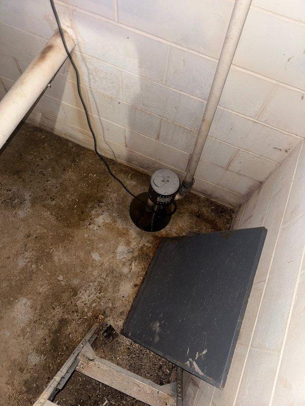 Performed scheduled plumbing maintenance inspection per prepaid service agreement. Inspected shower installation, verifying proper function of multi-function shower head and checking metal enclosure for water-tightness at seams and fastener points. Examined basement sump pump system, confirmed proper positioning in concrete basin, and verified drainage functionality. No immediate issues requiring repair were identified; system renewal documented through 7/4/26.