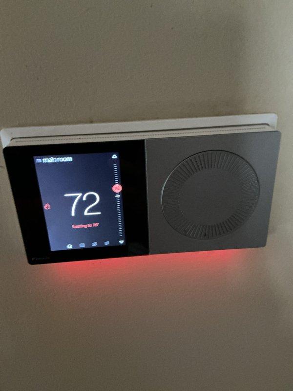 Performed routine maintenance on residential heating system. Inspected thermostat functionality (currently set to 72°F and operating properly) and examined the HVAC unit, confirming proper condensate drainage through PVC piping. Customer had recently replaced air filter prior to service visit.