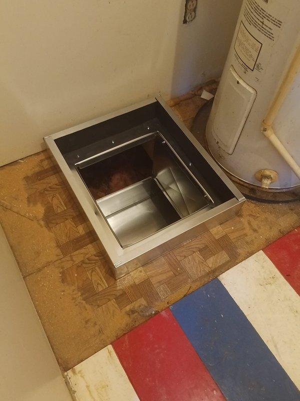 Installed new Lennox heat pump system with complete ductwork replacement. Accessed system through floor panel near water heater and conducted thorough inspection of crawl space, noting areas with sagging fiberglass insulation between floor joists. Installed new metal ductwork through the crawl space area to ensure proper airflow and system efficiency.