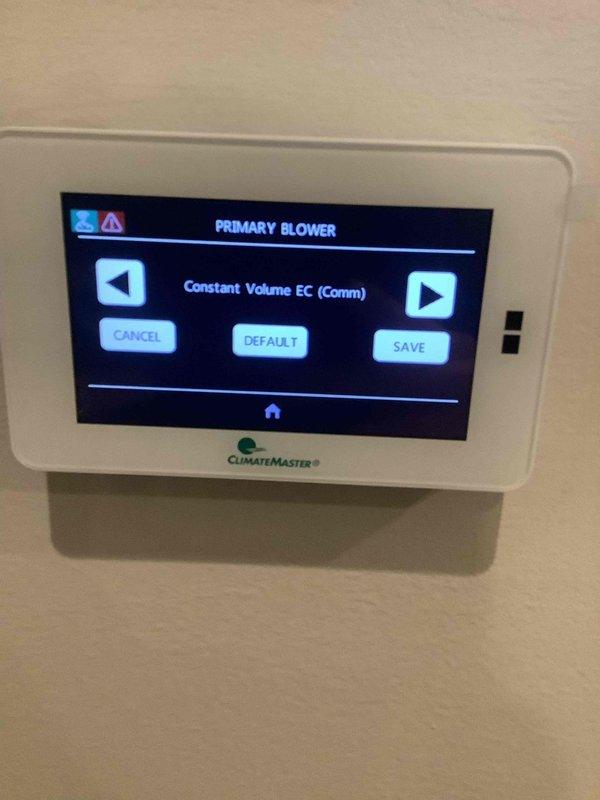 Performed warranty service on ClimateMaster geothermal system to resolve ECM configuration fault. Accessed system settings via digital thermostat interface to properly configure primary blower settings to "Constant Volume EC (Comm)" mode. Verified system operation after configuration adjustments, confirming system is now functioning as designed.