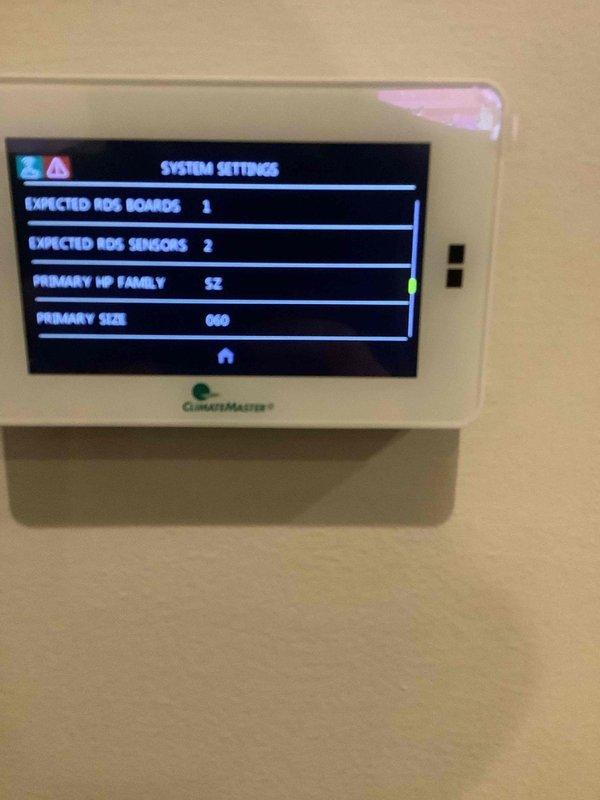 Performed warranty service on ClimateMaster geothermal system to resolve ECM configuration fault. Accessed system settings via digital thermostat interface to properly configure primary blower settings to "Constant Volume EC (Comm)" mode. Verified system operation after configuration adjustments, confirming system is now functioning as designed.