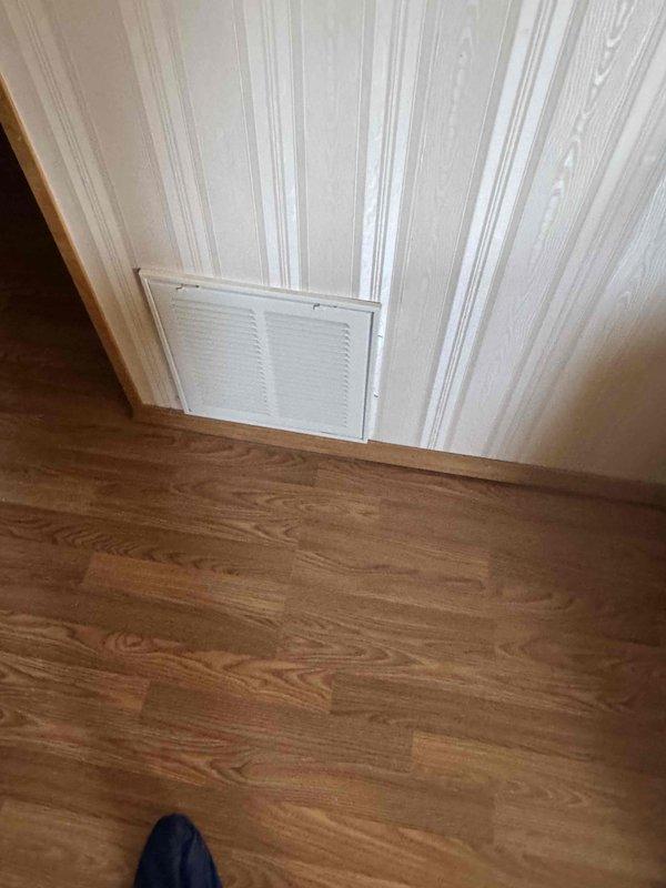 Performed site evaluation and determined need for two filter grills. Documented existing installation conditions, noting scattered debris under one vent. Items have been ordered for upcoming installation.