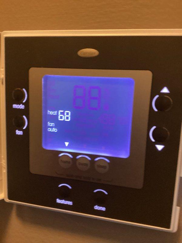 Performed complimentary furnace inspection with thorough system evaluation. Verified proper operation of two digital thermostats - one displaying 80°F with menu/help functionality and another showing 68°F in heat mode with fan set to auto. All components functioning within normal parameters with no issues detected.