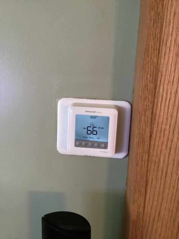 Performed basic monthly maintenance on CCH system. Inspected thermostat functionality (currently set to 55°F with actual temperature of 66°F) and verified fan auto mode operation. Examined evaporator coil and heat exchanger components, confirming proper condition with no visible issues. 20x20x4 filter not included in service.