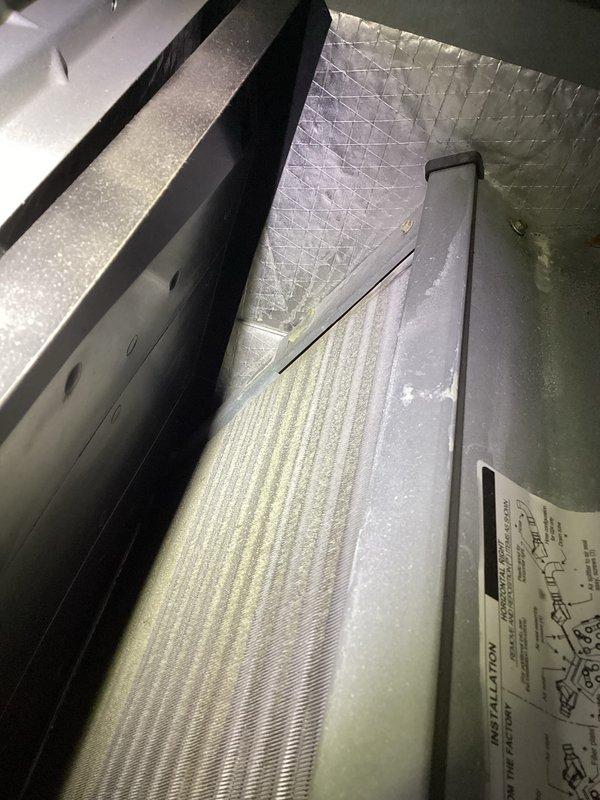 Performed basic monthly maintenance on CCH system. Inspected thermostat functionality (currently set to 55°F with actual temperature of 66°F) and verified fan auto mode operation. Examined evaporator coil and heat exchanger components, confirming proper condition with no visible issues. 20x20x4 filter not included in service.