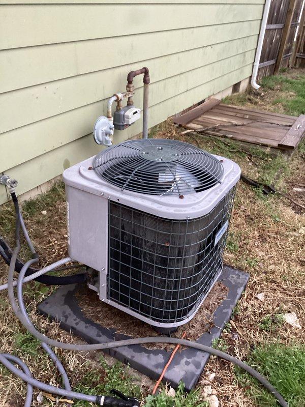 Performed scheduled cooling tune-up on residential AC system. Inspected blower wheel assembly and found it in normal working condition with no visible damage or unusual wear. Examined outdoor condensing unit which showed typical weathering but remains in functional condition with properly connected refrigerant lines and appropriate installation on concrete pad.