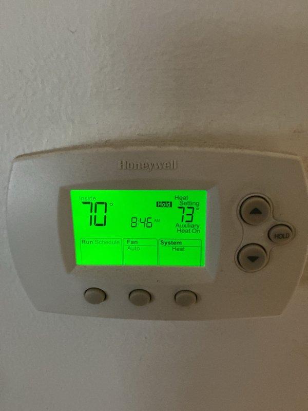 Performed monthly maintenance service on Carrier heating system, which included replacement of 20x20x4 filter. Inspected Honeywell digital thermostat displaying proper temperature readings and confirmed auxiliary heat function operating correctly. System is functioning within normal parameters with no issues identified.