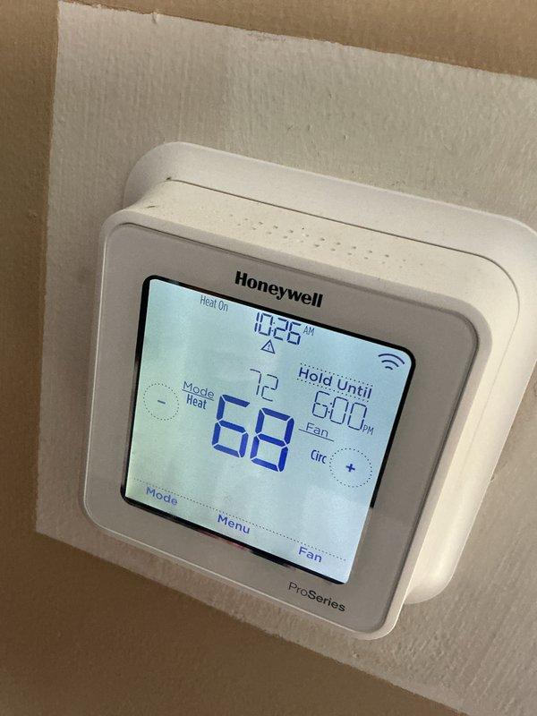 Completed monthly maintenance service on the HVAC system under the Value Monthly plan (20x20x4 filter not included). Inspected Honeywell ProSeries thermostat, confirming proper operation in heating mode with scheduled temperature hold functioning correctly. Examined water heater system including control valve and associated water treatment components, all found to be operating within normal parameters.