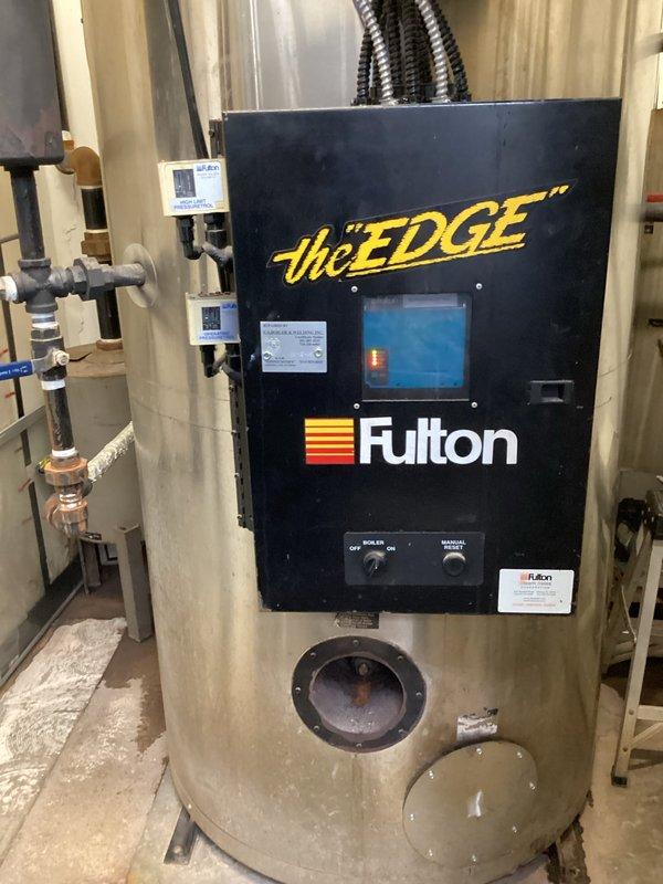 Diagnosed water heater that was repeatedly shutting off due to flame rollout issues. Inspected Fulton industrial boiler system and confirmed proper flame pattern through viewing port, ensuring safe operation after service.