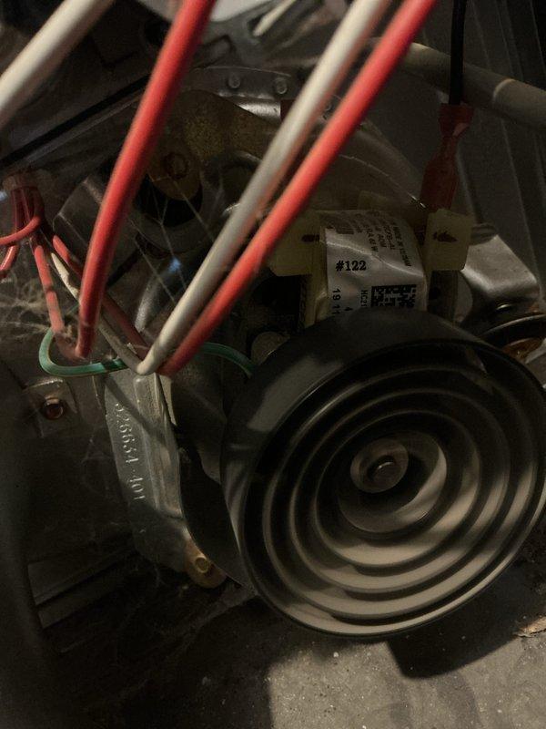 Performed basic monthly heating maintenance service on CCH system. Conducted combustion efficiency testing using Bacharach analyzer, which showed O₂ at 18.3% and CO at 31ppm. Inspected motor assembly, pulley system and electrical connections (#122 component) to ensure proper operation.