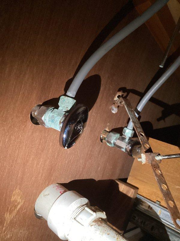 Replaced deteriorated bathroom faucet shutoff valve showing significant oxidation and mineral buildup. Installed new chrome shutoff valve with flexible water line connection, ensuring proper seal and functionality. Inspected surrounding plumbing infrastructure for additional water damage and verified system operation with no leaks upon completion.
