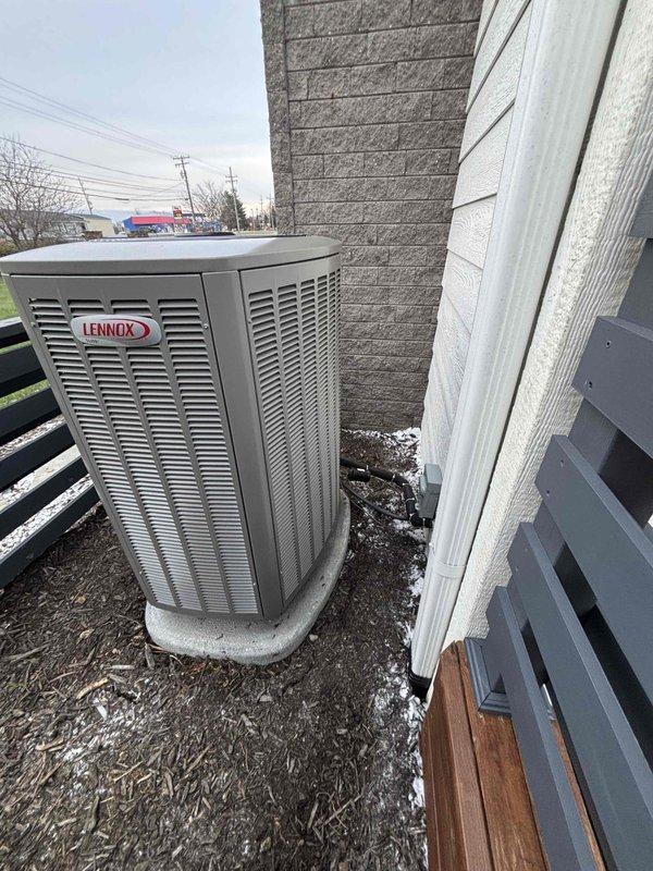 Performed installation of a complete Lennox heat pump system. Verified proper system operation with temperature readings showing 78.5°F at supply registers. Outdoor unit was properly mounted on concrete pad with appropriate clearances from structure, with all electrical connections secured and system charged to manufacturer specifications.
