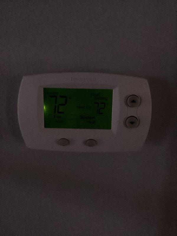 Performed comprehensive HVAC system maintenance service including inspection of furnace/air handler unit, verification of proper condensate drain line configuration, and confirmation of thermostat functionality (Honeywell digital model showing proper temperature reading of 72°F). Provided customer with maintenance plan information as requested.