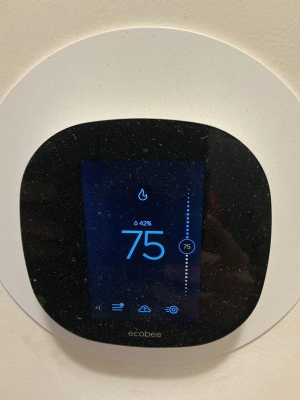 Performed monthly maintenance service on heating system. Inspected and cleaned blower wheel assembly to ensure proper air circulation. Verified Ecobee thermostat was operating correctly with heating function at 42% and displaying accurate temperature reading of 75°F.