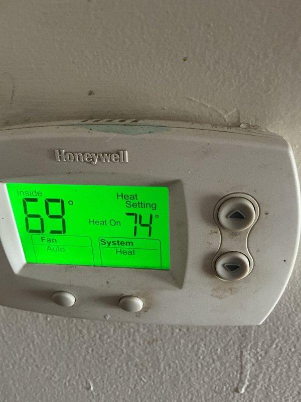 Completed monthly maintenance service on heating system including filter replacement with 20x20x1 filter. Performed combustion analysis using Bacharach Fyrite INTECH analyzer, which showed acceptable O2 levels at 7.3% and CO at 44 ppm. Verified thermostat operation in heat mode with proper temperature differential maintained between current (69°) and set point (74°).